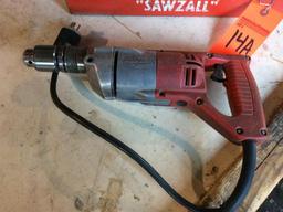 Milwaukee 1/2" drill w/ case.