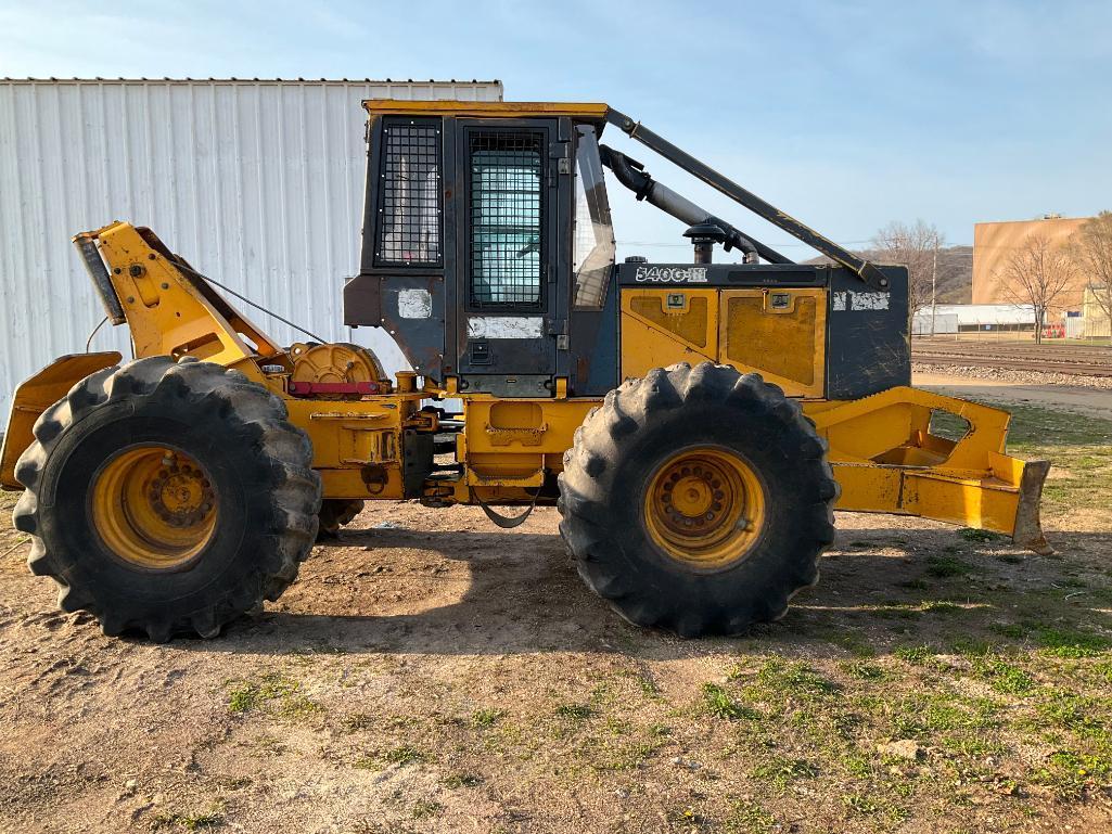 2000 John Deere 540 G III cable skidder; cab; 23.1 x 26 tires, 10,050 hours showing; s/n