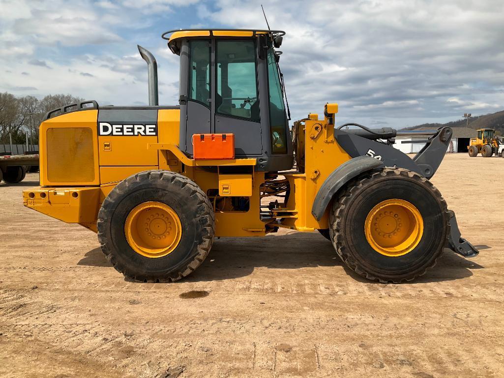 2006 John Deere 544 J wheel loader; cab w/ A.C.; JRB style Q.C.; 20.5R-25 tires; 3rd valve; 15,695