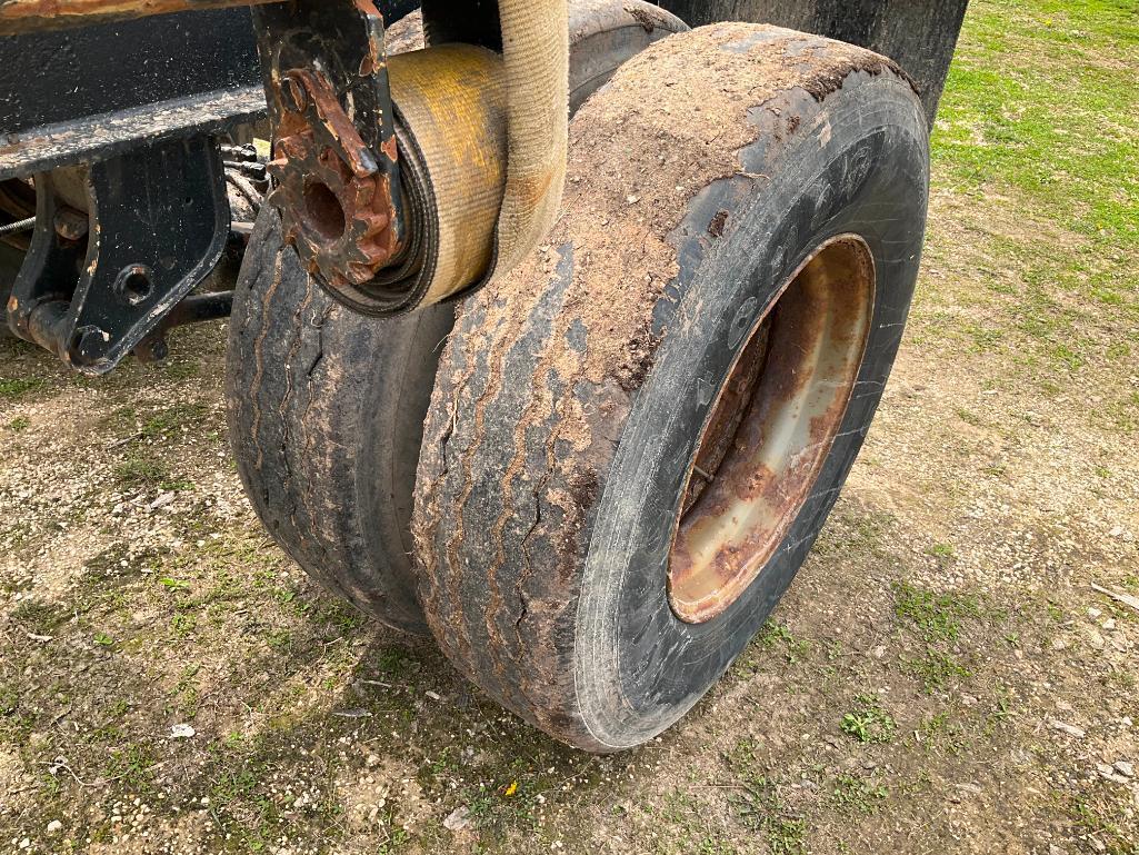 (TITLE) 1981 Cedar 2-axle 16' log pup trailer; 11R 22.5 tires, spring ride; steel stakes; s/n