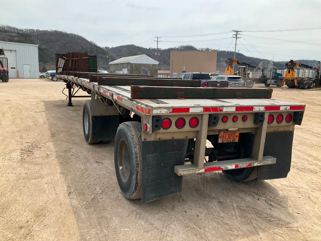 (TITLE) 1996 Benson 48' x 96" aluminum 10' spread axle flatbed trailer, air ride; bunks and