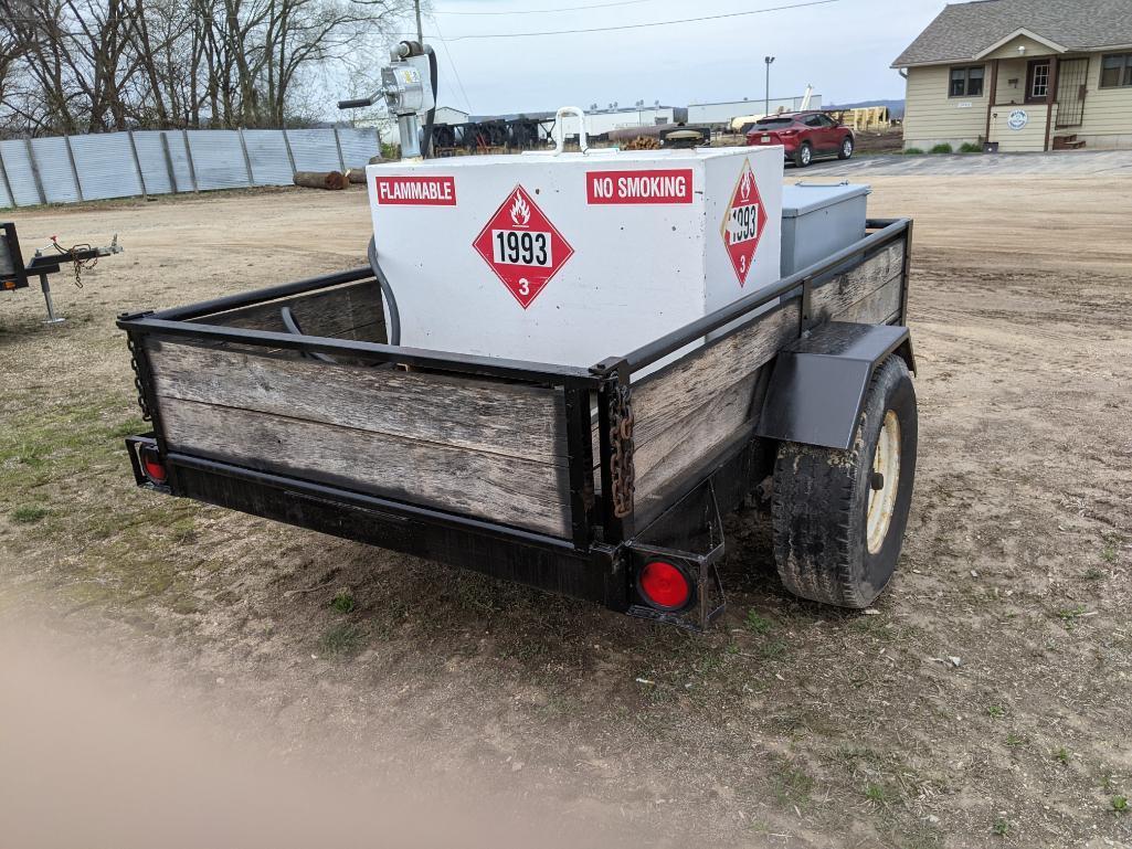 6' x 10' single axle trailer equipped with 100-gallon fuel tank w/ hand pump; tool box & ball hitch.