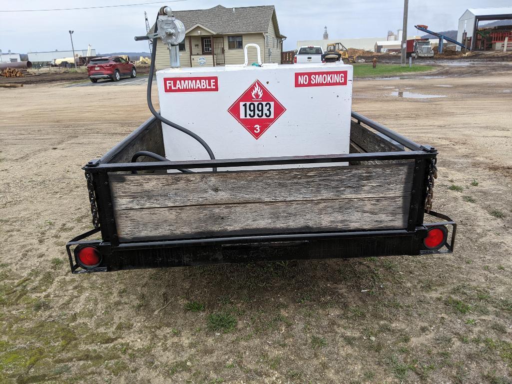 6' x 10' single axle trailer equipped with 100-gallon fuel tank w/ hand pump; tool box & ball hitch.