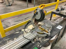 DeWalt DW703 mitre saw on table.