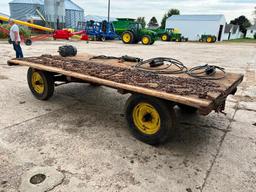 7' x 14' wood flat rack on John Deere 953 4-wheel wagon, SN: NA.