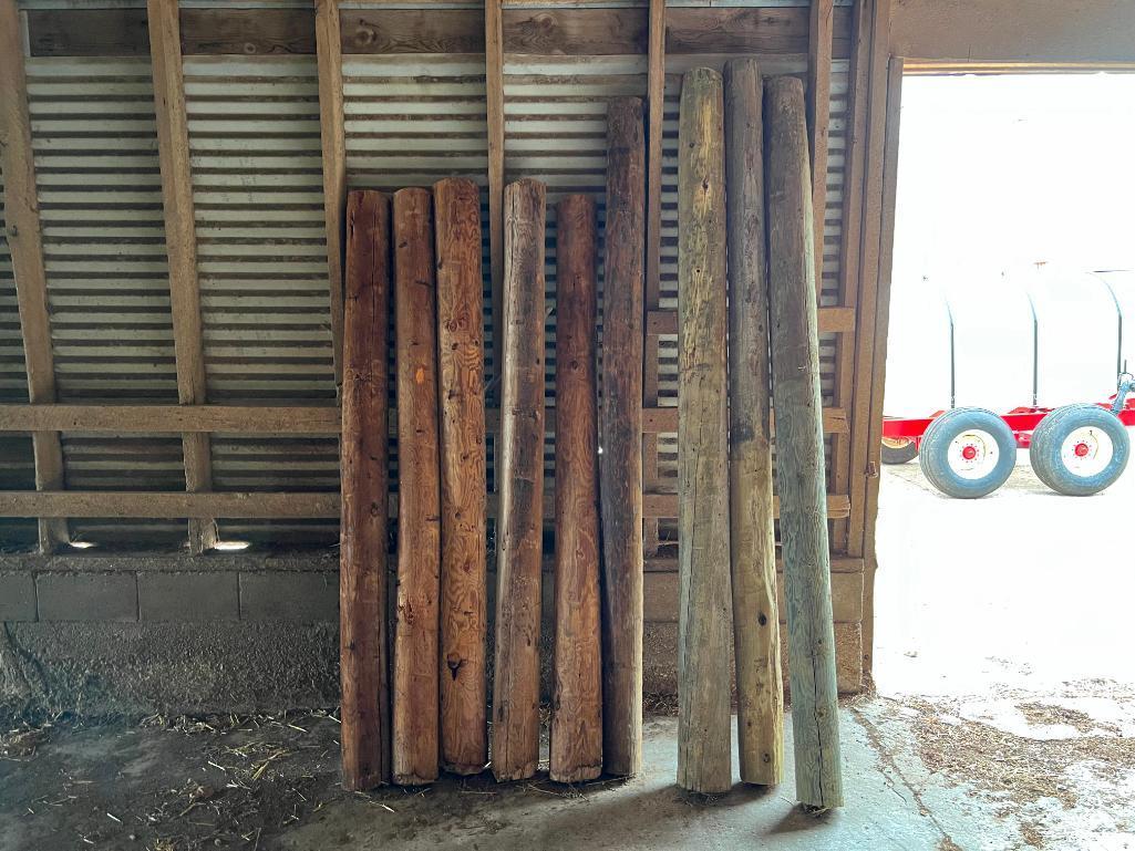 9-various length wood fence posts.