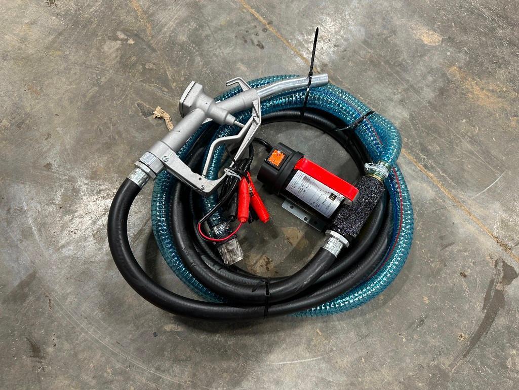 NEW 12-volt diesel fuel pump w/ nozzle & hose.