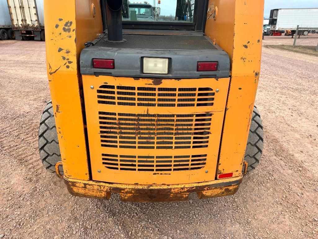 2007 Case 450 skid steer, OROPS, aux hyds, hyd quick coupler, 12x16.5 tires, hand controls, Ride