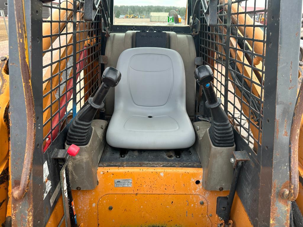 2007 Case 450 skid steer, OROPS, aux hyds, hyd quick coupler, 12x16.5 tires, hand controls, Ride