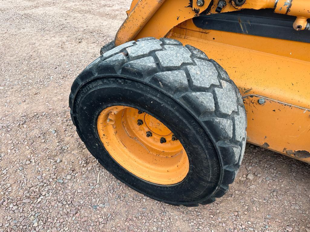 2007 Case 450 skid steer, OROPS, aux hyds, hyd quick coupler, 12x16.5 tires, hand controls, Ride