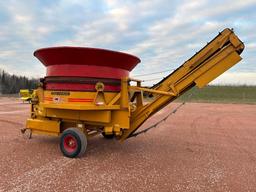 Haybuster H-1000 tub grinder bale processor, 1000 PTO drive, folding rubber belt discharge conveyor,