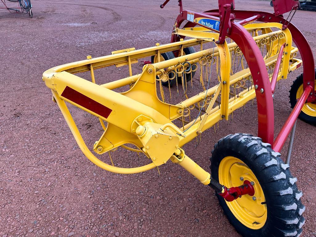 2014 New Holland 256 hay rake, front dolly wheels, low use, SN: YEN130048.