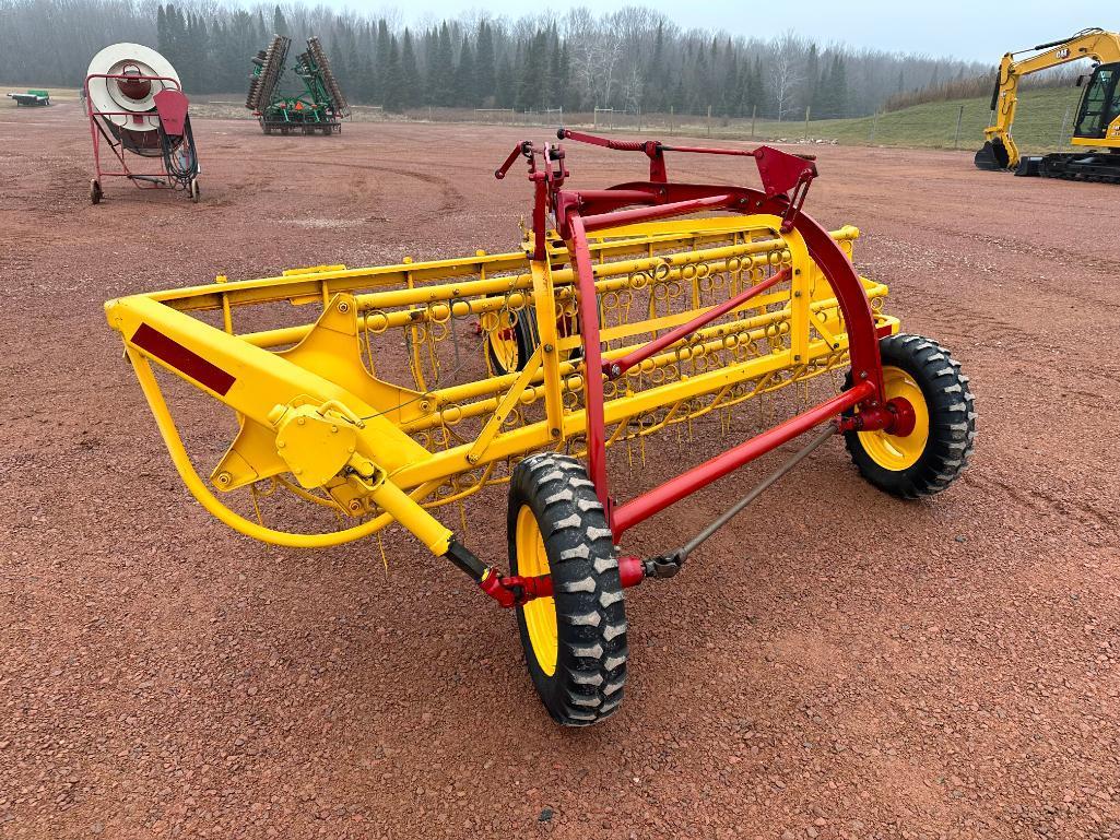 2014 New Holland 256 hay rake, front dolly wheels, low use, SN: YEN130048.