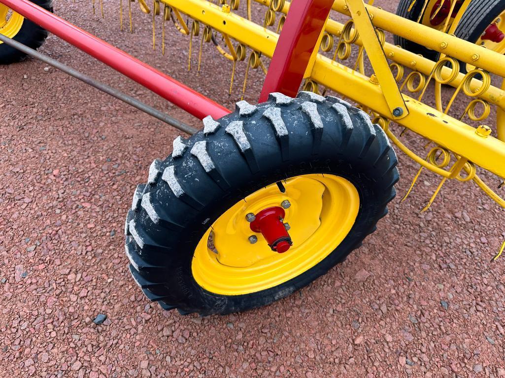 2014 New Holland 256 hay rake, front dolly wheels, low use, SN: YEN130048.