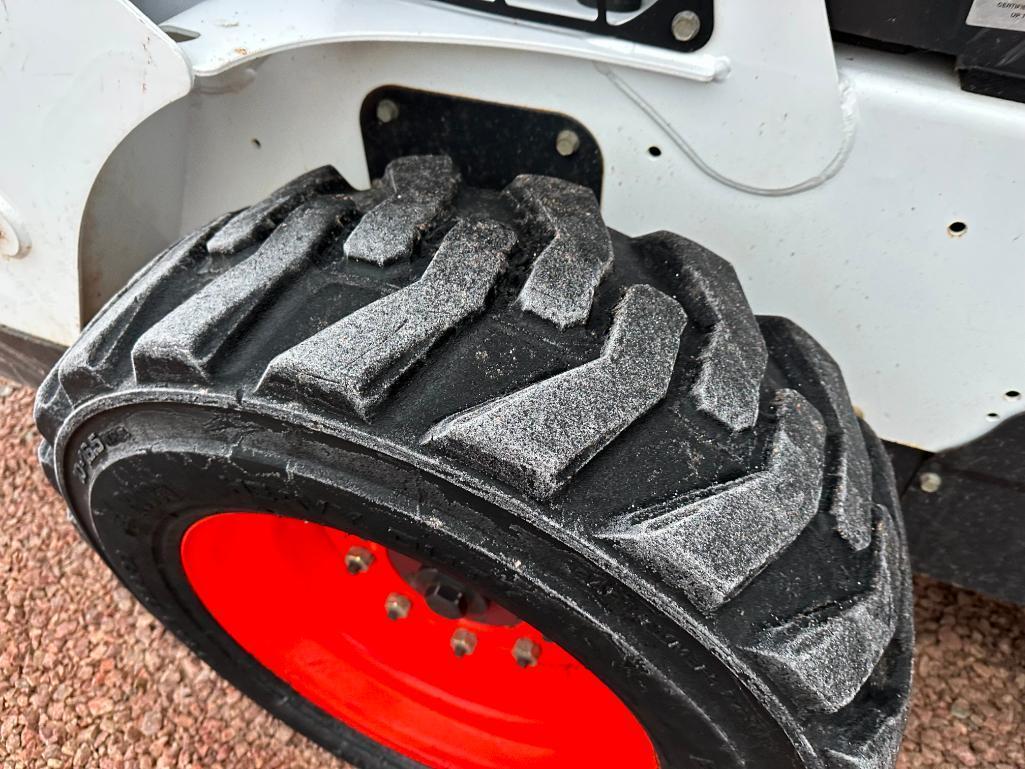 2014 Bobcat S570 skid steer, cab w/heat, high flow aux hyds, 2-spd, Power Bob Tach, bucket, 10x16.5