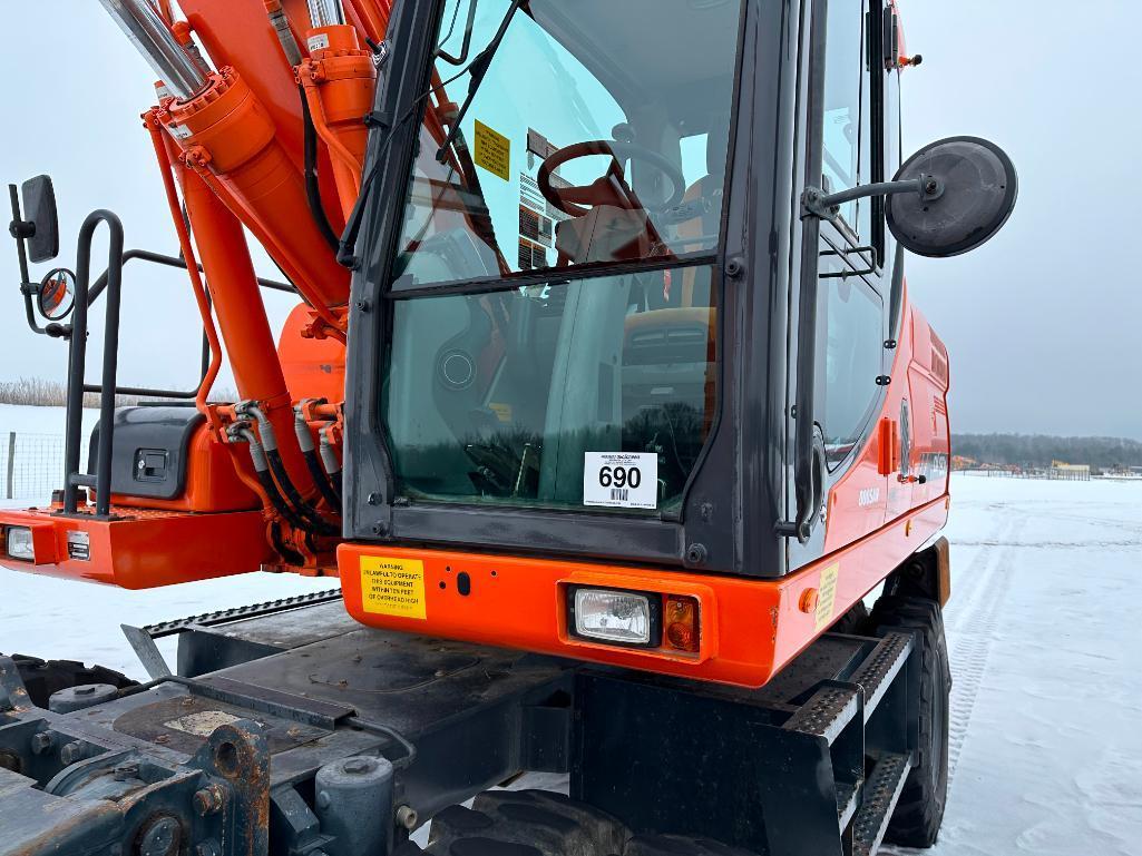 2013 Doosan DX190W-3 wheel excavator, cab w/AC, 7'7" stick, front blade, 10.00x20 tires, 36" quick