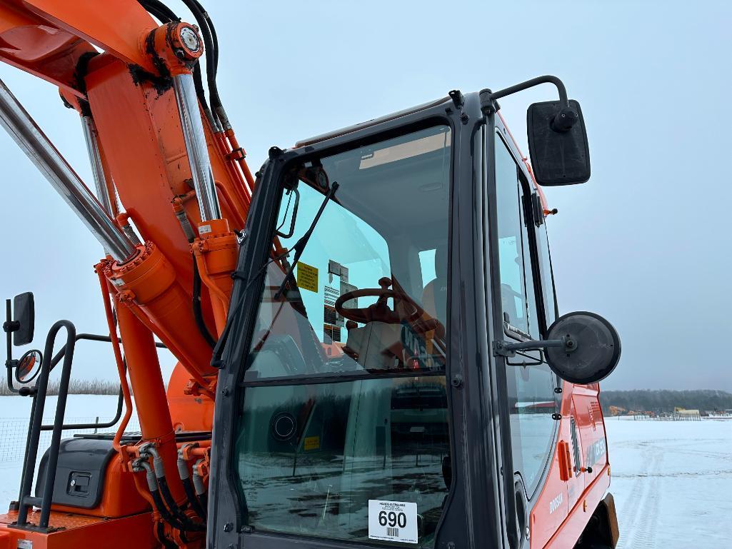 2013 Doosan DX190W-3 wheel excavator, cab w/AC, 7'7" stick, front blade, 10.00x20 tires, 36" quick