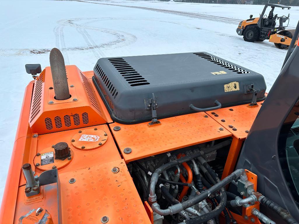 2013 Doosan DX190W-3 wheel excavator, cab w/AC, 7'7" stick, front blade, 10.00x20 tires, 36" quick