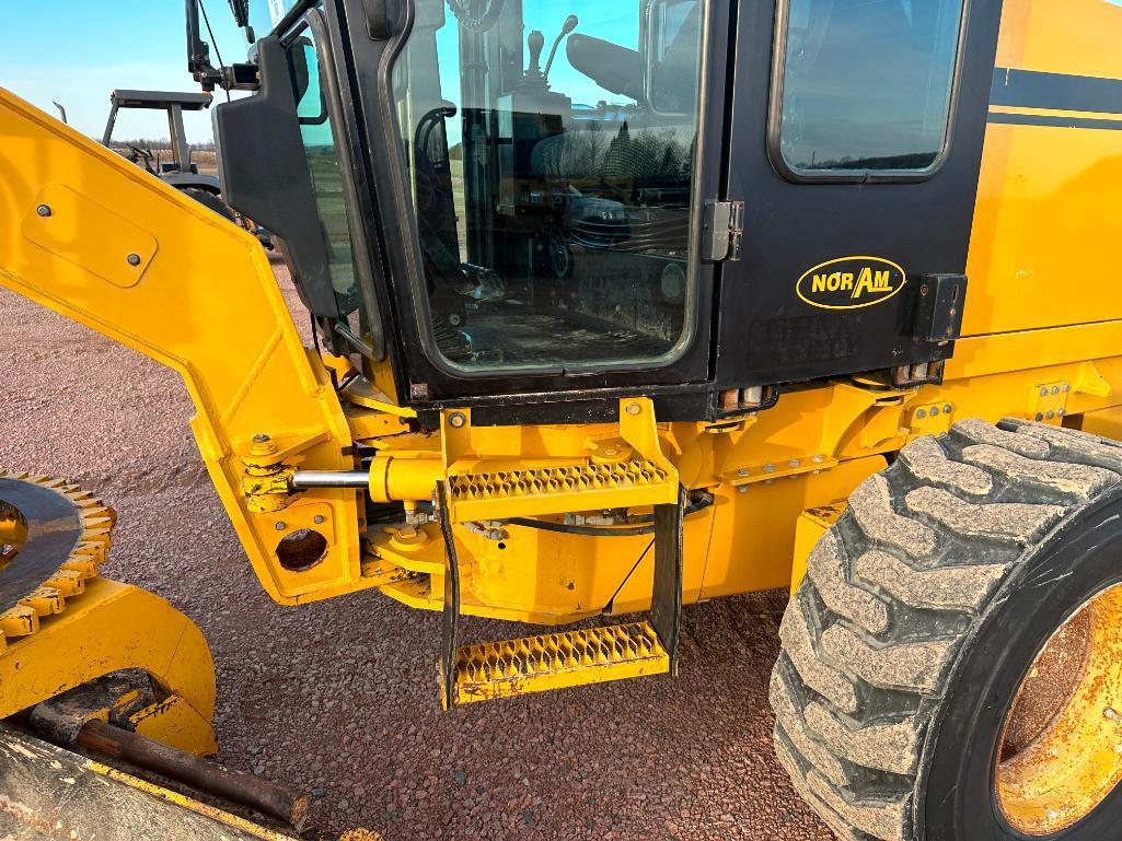 2010 Noram 65E motor grader, cab w/AC, 4 wheel drive, Cat diesel engine, 15-19.5 tires, powershift