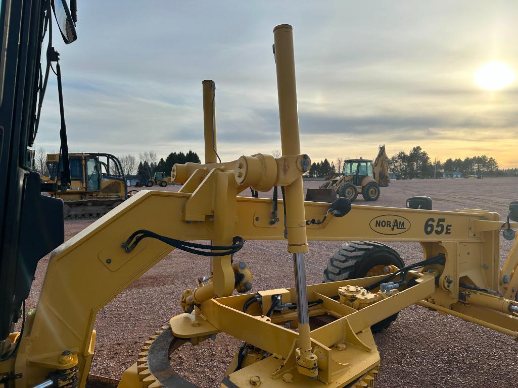 2010 Noram 65E motor grader, cab w/AC, 4 wheel drive, Cat diesel engine, 15-19.5 tires, powershift