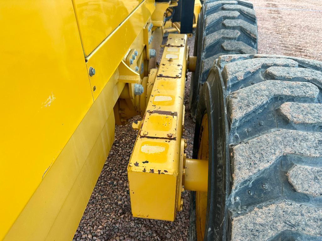 2010 Noram 65E motor grader, cab w/AC, 4 wheel drive, Cat diesel engine, 15-19.5 tires, powershift