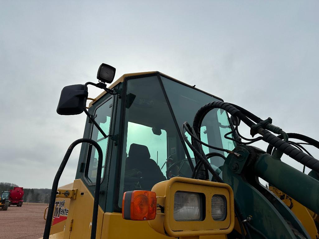 2002 Kawasaki 65TMV wheel loader, cab w/AC, 20.5x25 tires, 4-spd powershift trans, JRB quick coupler