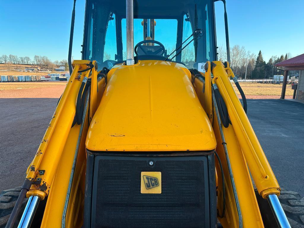 JCB 3CX tractor loader backhoe, cab w/AC, 4x4, ext hoe, shuttle trans, 2-stick control, quick