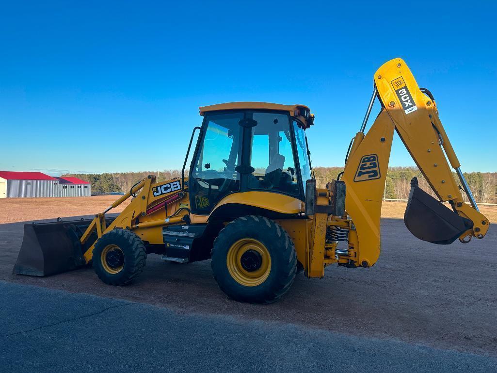 JCB 3CX tractor loader backhoe, cab w/AC, 4x4, ext hoe, shuttle trans, 2-stick control, quick