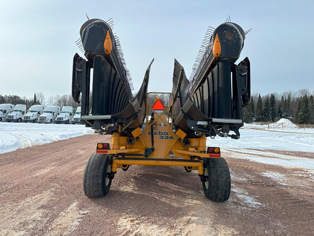 2010 Oxbo 334 34' continuous hay merger, 2pt hitch, PTO drive, steerable axle, transport lights,