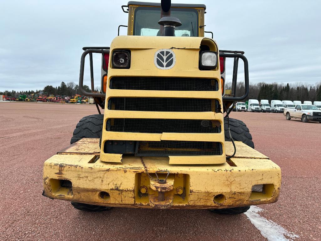 2001 New Holland LW170 wheel loader, cab w/heat, 20.5x25 tires, 4-spd powershift trans, 3rd valve,