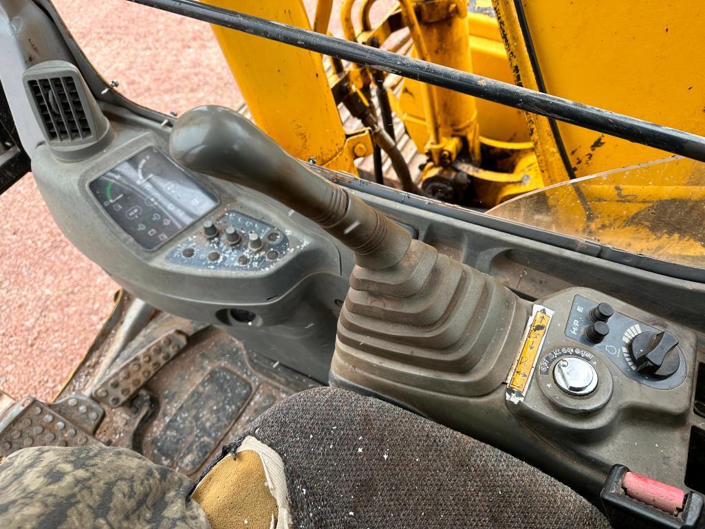 1997 John Deere 120 excavator, cab w/heat, 27 1/2" track pads, 36" bucket, manual thumb, runs &