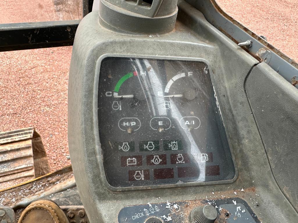 1997 John Deere 120 excavator, cab w/heat, 27 1/2" track pads, 36" bucket, manual thumb, runs &