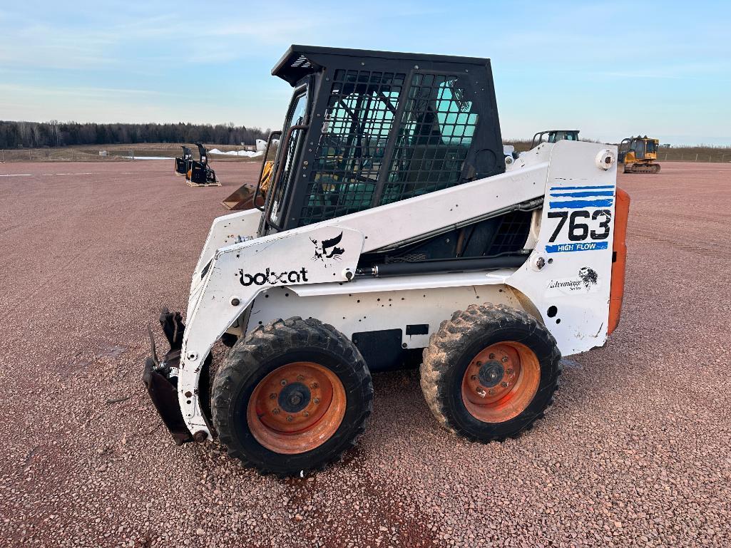 1999 Bobcat 763F skid steer, cab w/heat, high flow aux hyds, 10x16.5 tires, hand & foot controls,