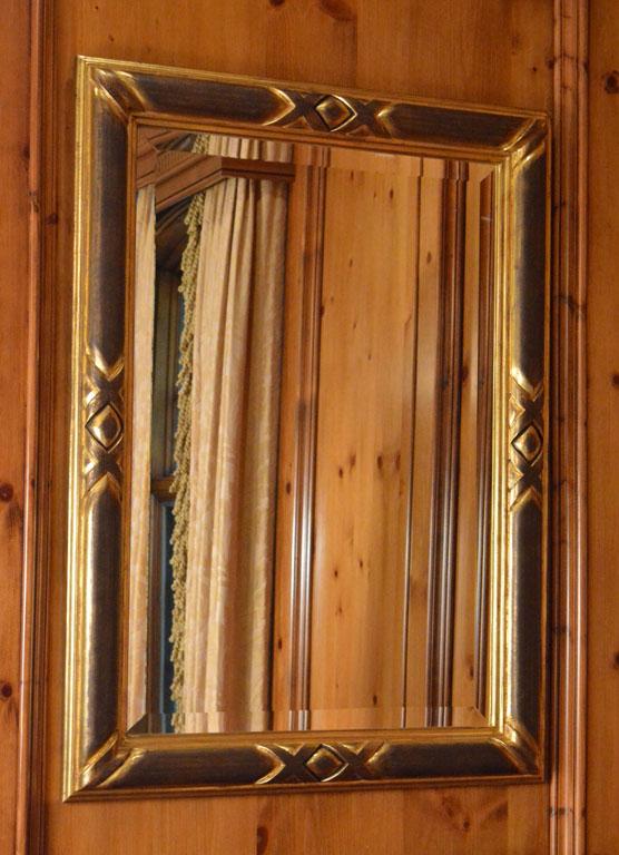 Pair of Ebonized and Giltwood Mirrors