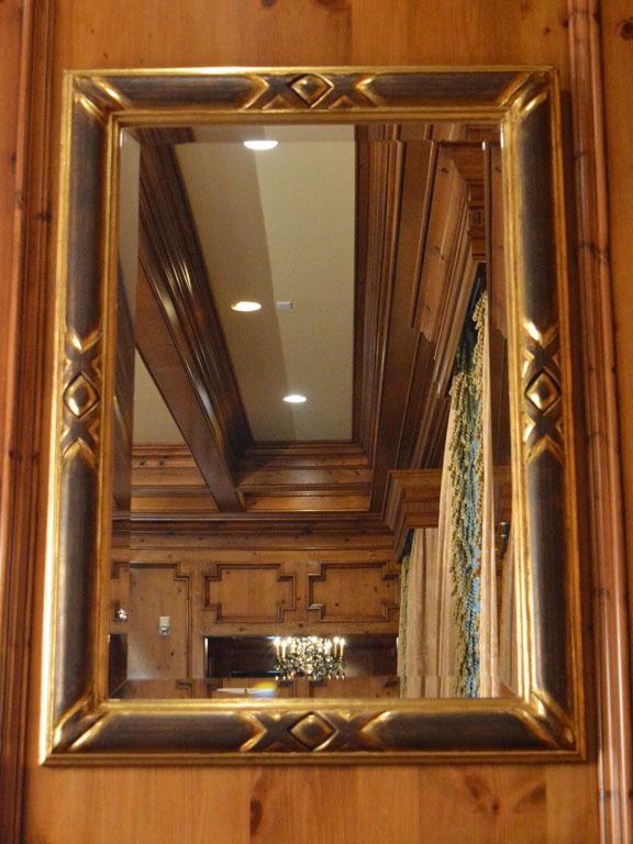 Pair of Ebonized and Giltwood Mirrors