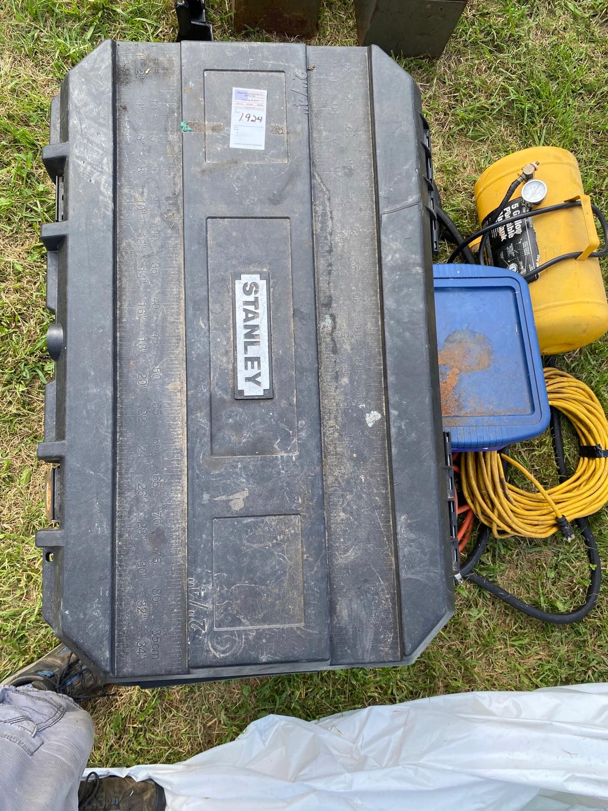 stanley job box with tools, air tank, water hose