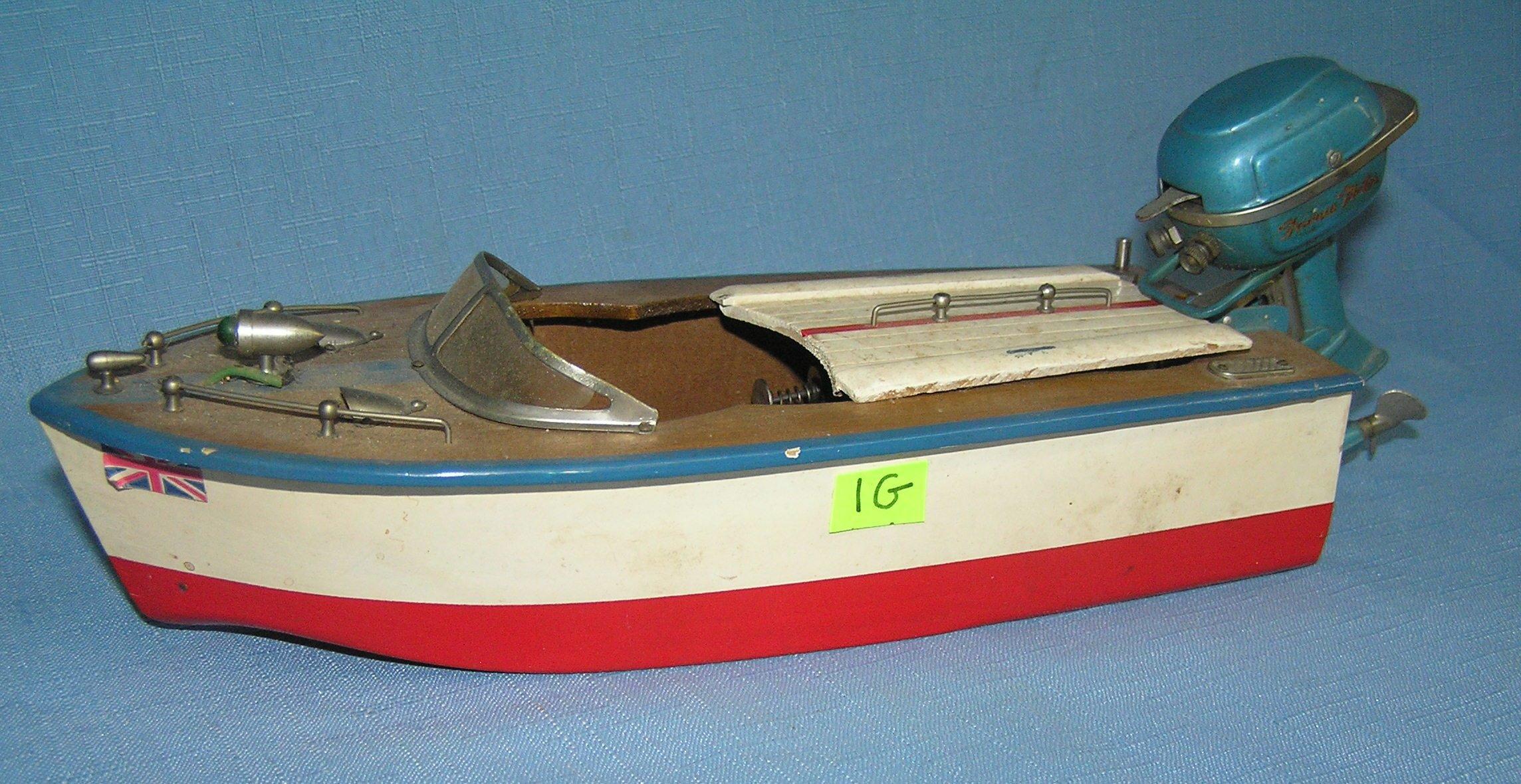 Wooden boat w/ Famous motors outboard motor