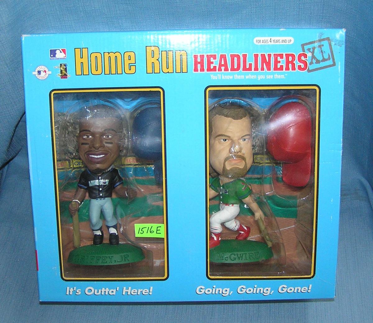 K. Griffey Jr. and M. McGwire bobble head dolls