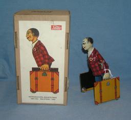 Paya Toys retro mechanical windup porter toy