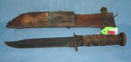 WWII US Navy fighting knife with scabbard and sharpener