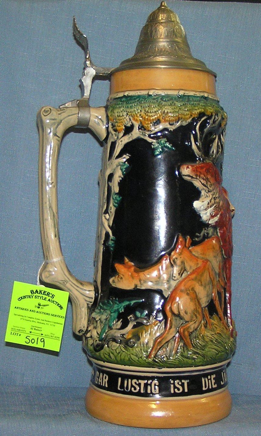 German beer stein with Black Forest theme animals