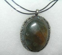 Natural stone necklace in cast metal holder