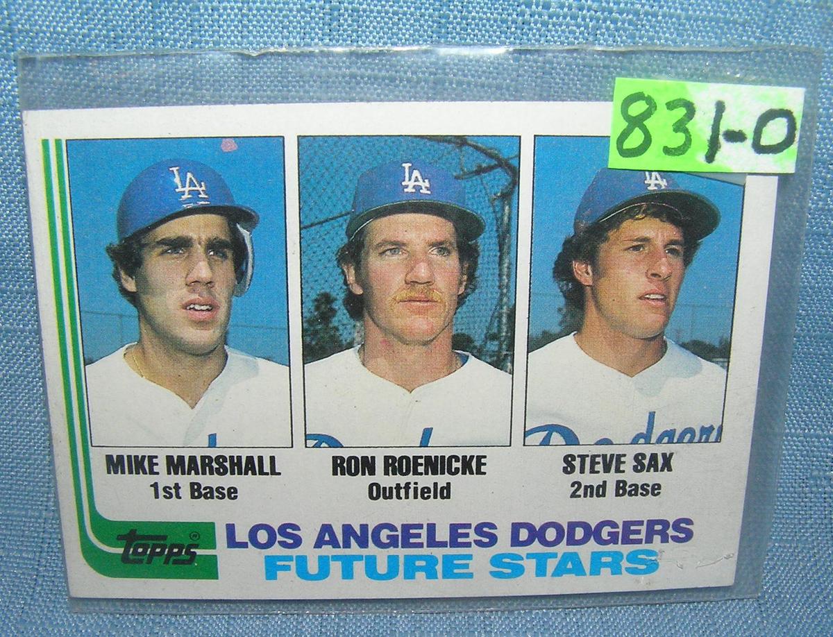 Mike Marshall, Steve Sax and Ron Roenicke rookie baseball card