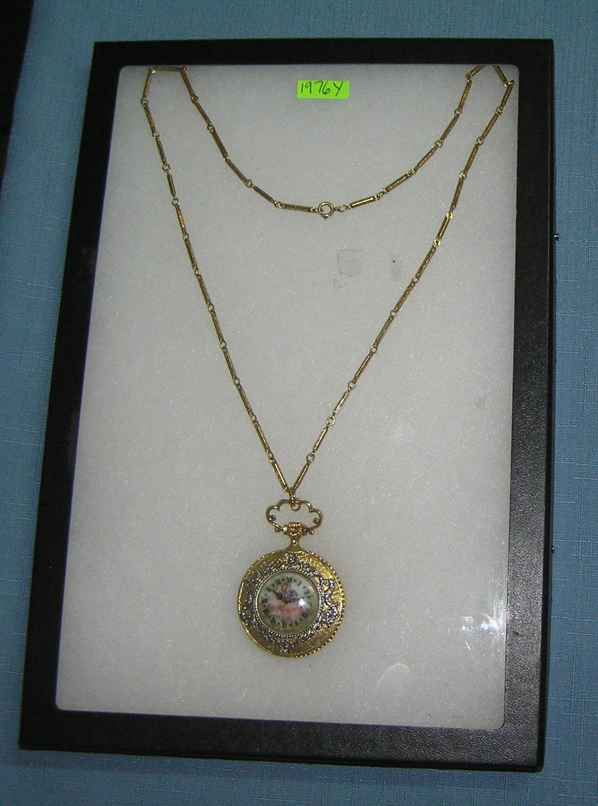 Victorian themed pocket watch shaped necklace