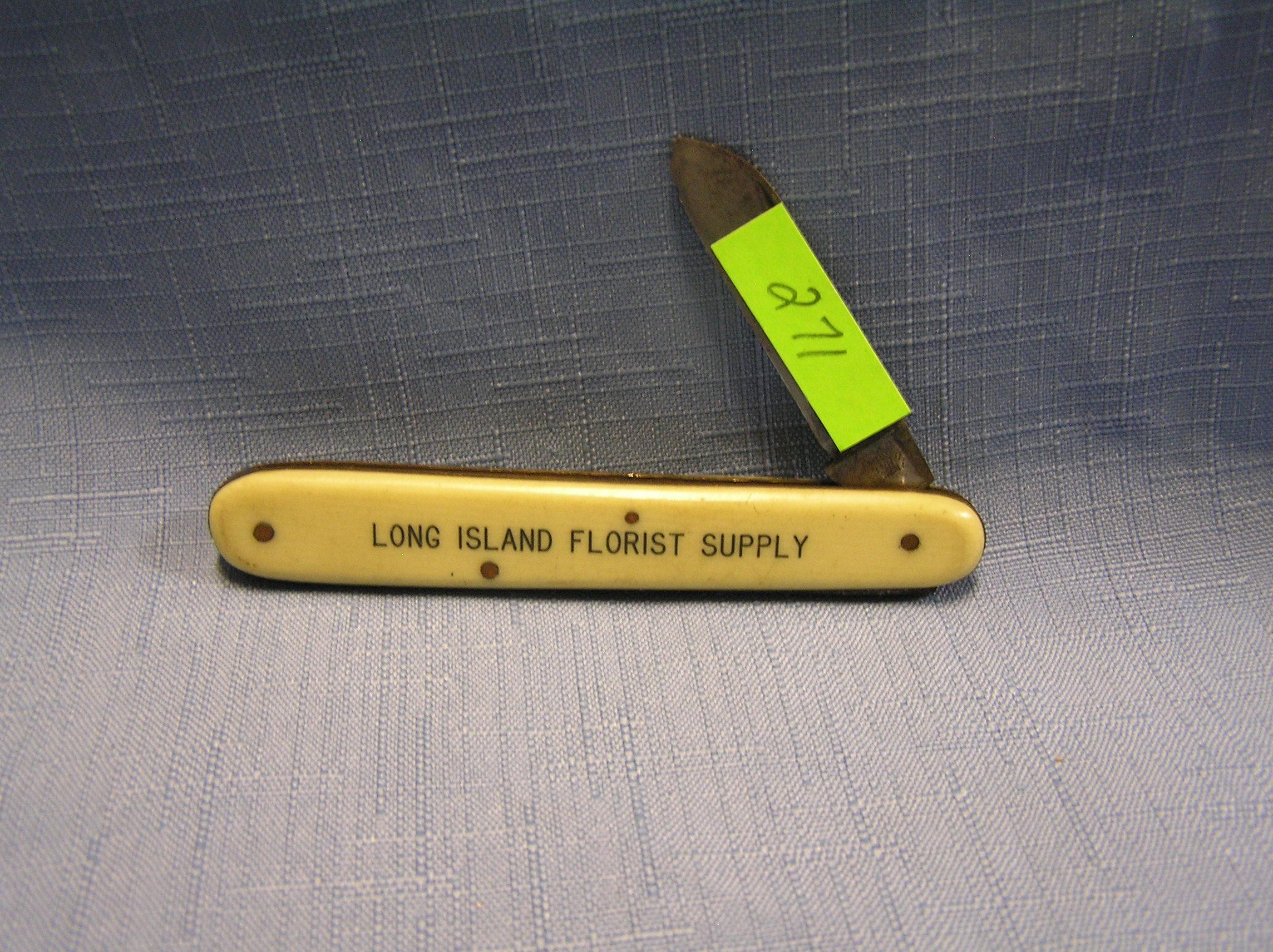 Antique celluloid advertising pocket knife