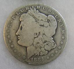 1885-O Morgan silver dollar in fair condition