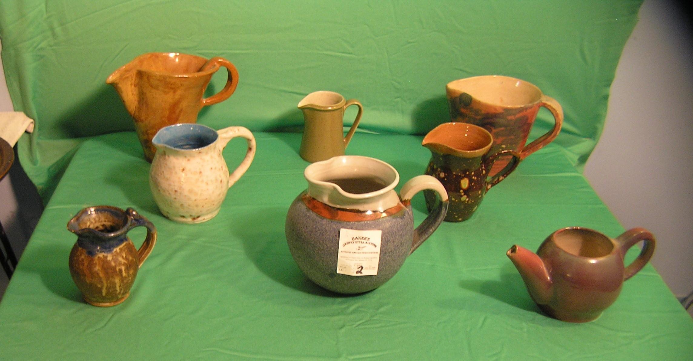 Collection of art pottery pitchers