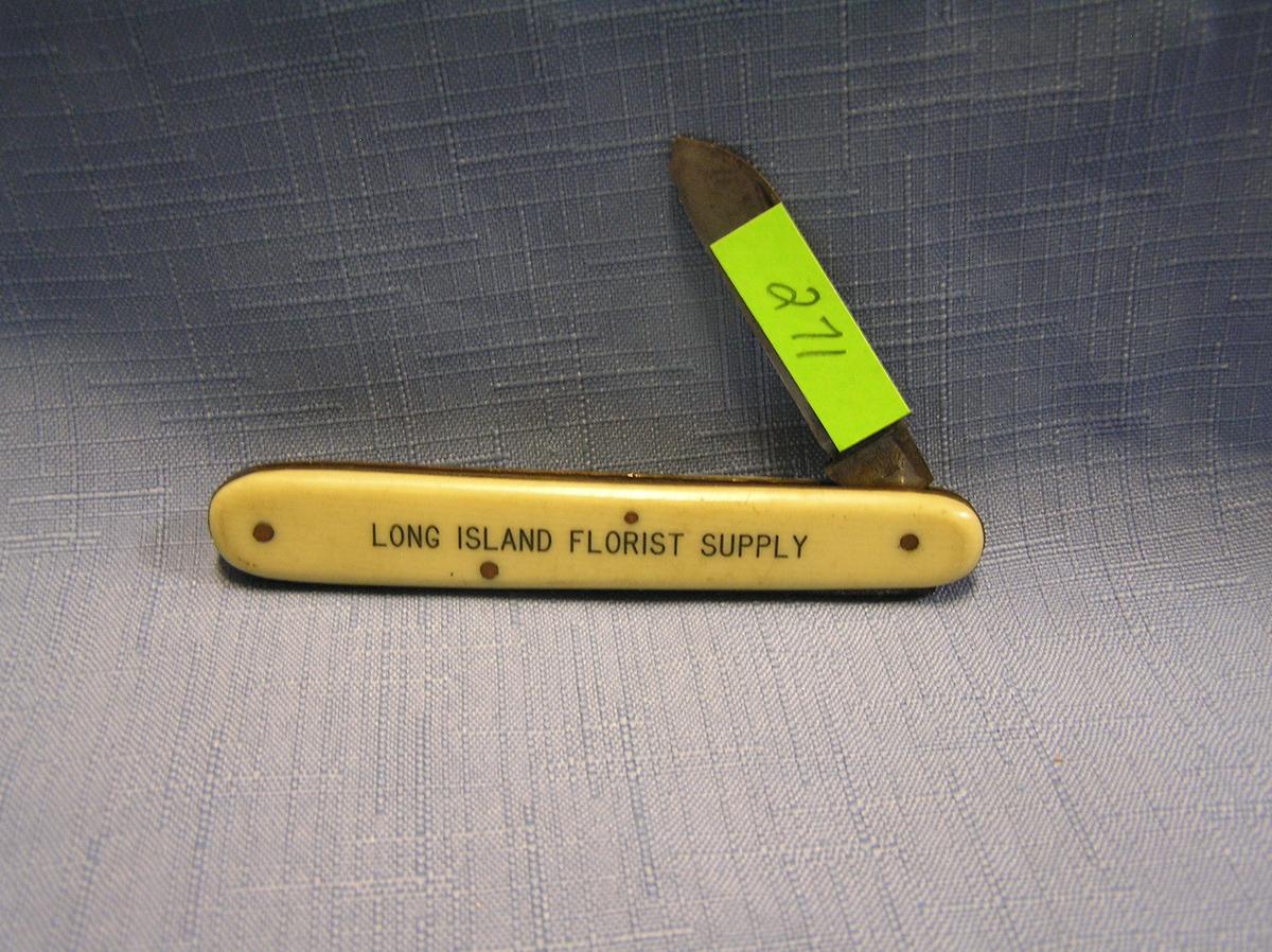 Antique celluloid advertising pocket knife