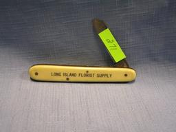 Antique celluloid advertising pocket knife