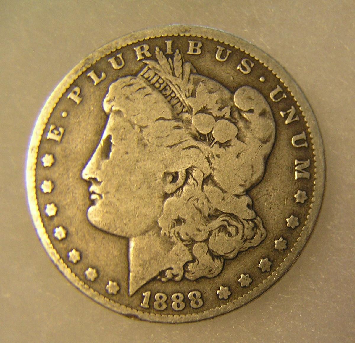 1880-O Morgan silver dollar in very good condition